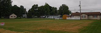 Grassy Residential Lot in Small Farming Community