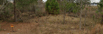Well over half an acre in a gorgeous area on the outskirts of town