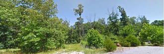 Nice lot at the end of a small street in the Bella Vista POA community