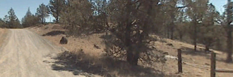 Almost two acres in far north California surrounded by mountains